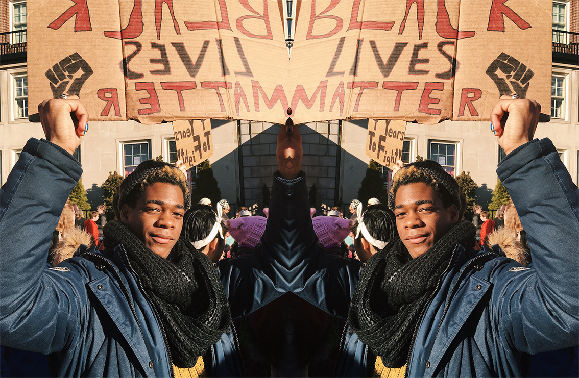 adwoa addae står med en BLM-skylt